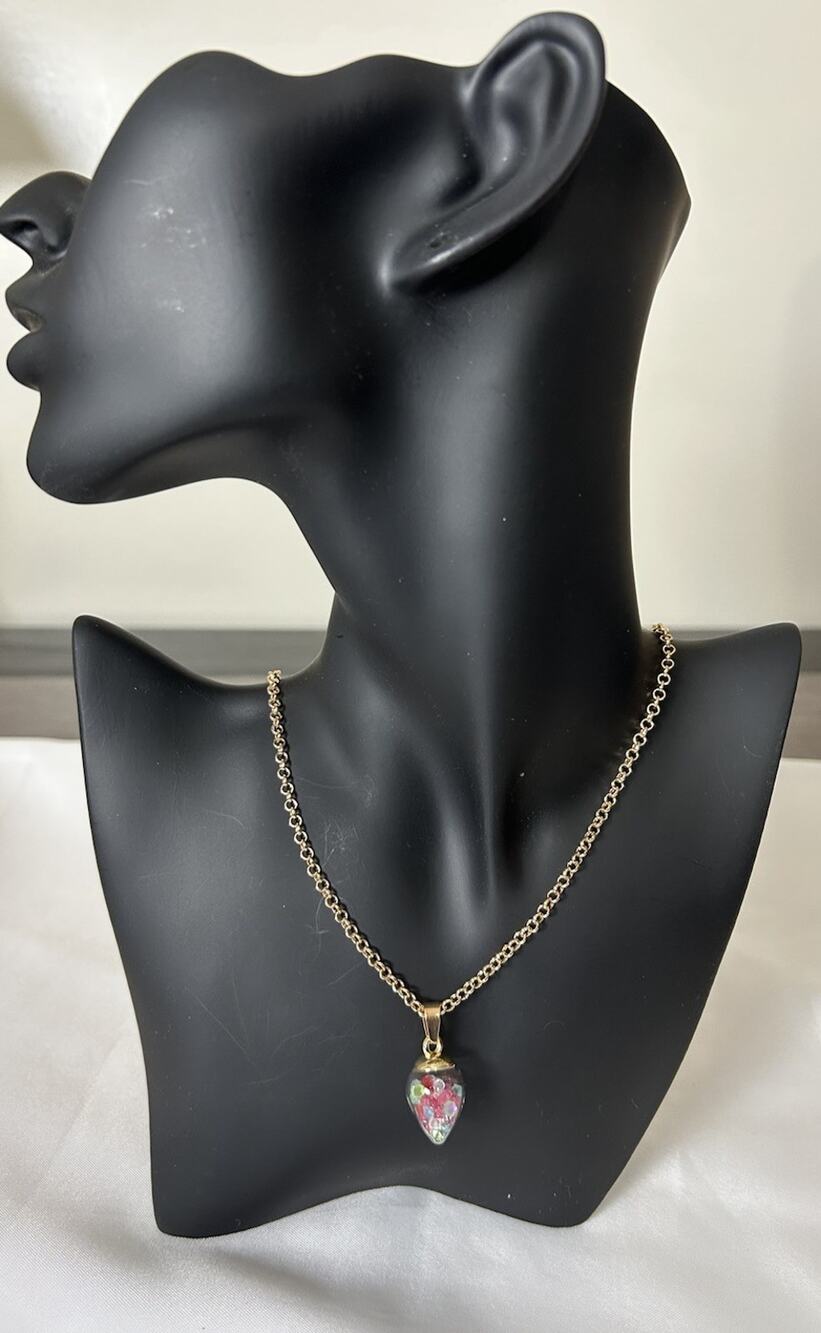 Lovely Gold Tone Teardrop Crystal Necklace. Measures 25”